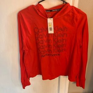 Red Calvin Klein performance sized medium shirt, hoodie
